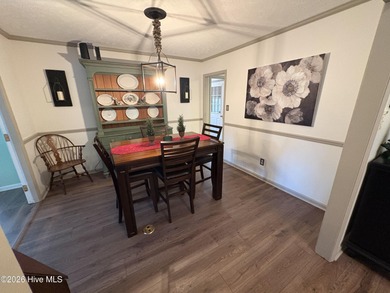 Welcome to this beautifully updated home offering a spectacular on Scotch Meadows Country Club in North Carolina - for sale on GolfHomes.com, golf home, golf lot