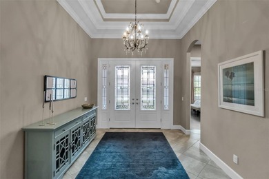 Live the quintessential Florida lifestyle inside the guard-gated on Esplanade Golf and Country at Lakewood Ranch in Florida - for sale on GolfHomes.com, golf home, golf lot