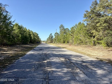 What a great spot to build a home. This corner lot is located on Sunny Hills Golf and Country Club in Florida - for sale on GolfHomes.com, golf home, golf lot