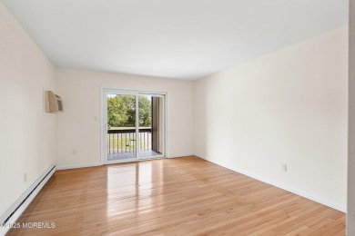 Beautiful, light-filled upper-floor 2-bedroom, 2 full bath unit on Pine Brook Golf Course in New Jersey - for sale on GolfHomes.com, golf home, golf lot