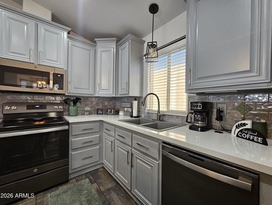 This beautifully upgraded 2-bedroom, 2-bath home offers laminate on Viewpoint Golf Resort in Arizona - for sale on GolfHomes.com, golf home, golf lot