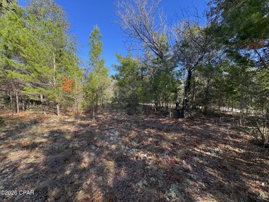 What a great spot to build a home. This corner lot is located on Sunny Hills Golf and Country Club in Florida - for sale on GolfHomes.com, golf home, golf lot