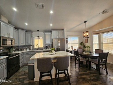This beautifully upgraded 2-bedroom, 2-bath home offers laminate on Viewpoint Golf Resort in Arizona - for sale on GolfHomes.com, golf home, golf lot