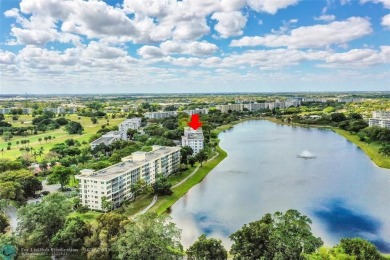 Immediately as you enter the foyer of this BRAND NEW renovated on Palm-Aire Country Club and Resort - Palms in Florida - for sale on GolfHomes.com, golf home, golf lot