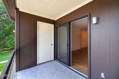 Beautiful, light-filled upper-floor 2-bedroom, 2 full bath unit on Pine Brook Golf Course in New Jersey - for sale on GolfHomes.com, golf home, golf lot