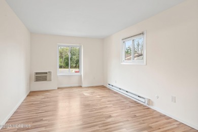 Beautiful, light-filled upper-floor 2-bedroom, 2 full bath unit on Pine Brook Golf Course in New Jersey - for sale on GolfHomes.com, golf home, golf lot