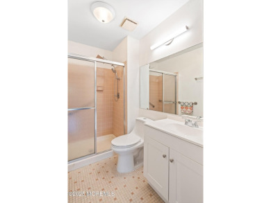 Beautiful, light-filled upper-floor 2-bedroom, 2 full bath unit on Pine Brook Golf Course in New Jersey - for sale on GolfHomes.com, golf home, golf lot