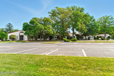 Beautiful, light-filled upper-floor 2-bedroom, 2 full bath unit on Pine Brook Golf Course in New Jersey - for sale on GolfHomes.com, golf home, golf lot