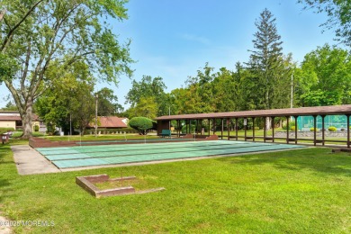 Beautiful, light-filled upper-floor 2-bedroom, 2 full bath unit on Pine Brook Golf Course in New Jersey - for sale on GolfHomes.com, golf home, golf lot