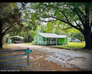 Living in Starke, Florida offers a blend of small-town charm on Starke Golf and Country Club in Florida - for sale on GolfHomes.com, golf home, golf lot