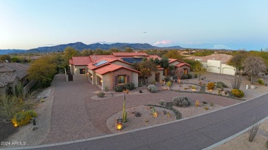 As you approach the home, the paved circular drive welcomes you on The Boulders Resort Golf Club in Arizona - for sale on GolfHomes.com, golf home, golf lot