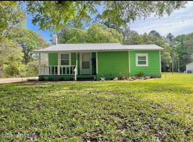 Living in Starke, Florida offers a blend of small-town charm on Starke Golf and Country Club in Florida - for sale on GolfHomes.com, golf home, golf lot