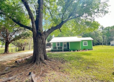 Living in Starke, Florida offers a blend of small-town charm on Starke Golf and Country Club in Florida - for sale on GolfHomes.com, golf home, golf lot