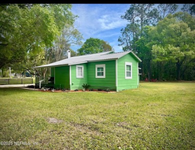 Living in Starke, Florida offers a blend of small-town charm on Starke Golf and Country Club in Florida - for sale on GolfHomes.com, golf home, golf lot