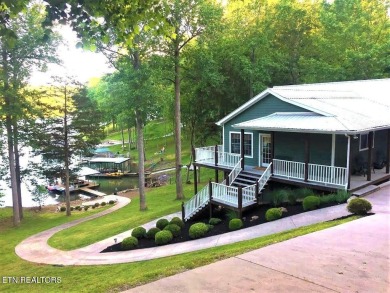 Beautiful lakefront basement/ranch home with plenty of space on The Greens at Deerfield in Tennessee - for sale on GolfHomes.com, golf home, golf lot