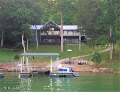 Beautiful lakefront basement/ranch home with plenty of space on The Greens at Deerfield in Tennessee - for sale on GolfHomes.com, golf home, golf lot