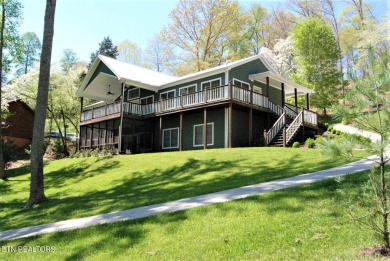 Beautiful lakefront basement/ranch home with plenty of space on The Greens at Deerfield in Tennessee - for sale on GolfHomes.com, golf home, golf lot