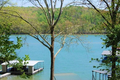 Beautiful lakefront basement/ranch home with plenty of space on The Greens at Deerfield in Tennessee - for sale on GolfHomes.com, golf home, golf lot