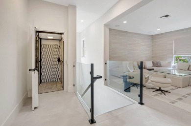 Arrive in style via your private elevator to a residence that on Boca Delray Golf and Country Club in Florida - for sale on GolfHomes.com, golf home, golf lot