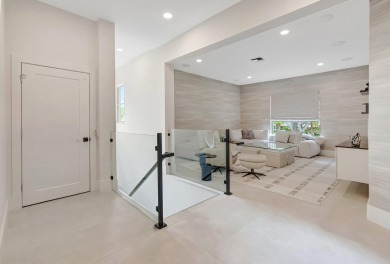 Arrive in style via your private elevator to a residence that on Boca Delray Golf and Country Club in Florida - for sale on GolfHomes.com, golf home, golf lot