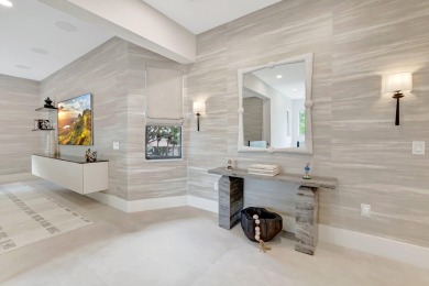 Arrive in style via your private elevator to a residence that on Boca Delray Golf and Country Club in Florida - for sale on GolfHomes.com, golf home, golf lot
