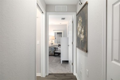 Welcome to this beautifully updated end-unit condo offering on River Strand Golf and Country Club At Heritage Harbour  in Florida - for sale on GolfHomes.com, golf home, golf lot