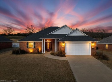 This beautifully updated Alma home offers a refined blend of on Eagle Crest Golf Course in Arkansas - for sale on GolfHomes.com, golf home, golf lot