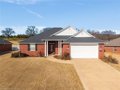 This beautifully updated Alma home offers a refined blend of on Eagle Crest Golf Course in Arkansas - for sale on GolfHomes.com, golf home, golf lot