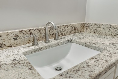 Fantastic location in the gated community of Shalimar Pointe. A on Shalimar Pointe Golf and Country Club in Florida - for sale on GolfHomes.com, golf home, golf lot