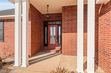 This beautifully updated Alma home offers a refined blend of on Eagle Crest Golf Course in Arkansas - for sale on GolfHomes.com, golf home, golf lot