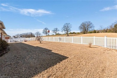 This beautifully updated Alma home offers a refined blend of on Eagle Crest Golf Course in Arkansas - for sale on GolfHomes.com, golf home, golf lot