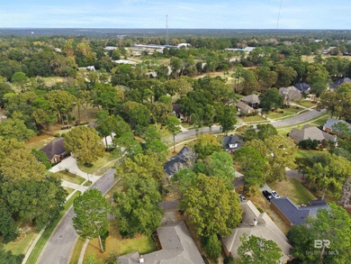 Welcome to this beautifully maintained 4-bedroom, 3-bath home in on TimberCreek Golf Club in Alabama - for sale on GolfHomes.com, golf home, golf lot