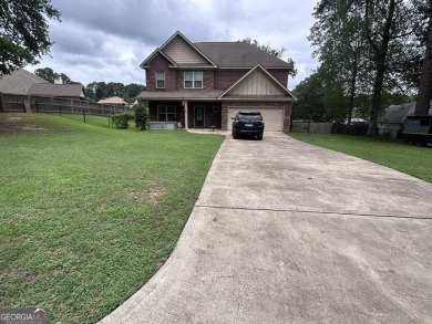 Midland, GA (Harris County) 4 Bed | 2.5 Bath | Waterfront on Woodlands Hills Golf Course in Georgia - for sale on GolfHomes.com, golf home, golf lot