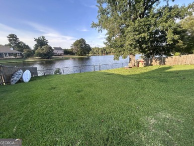 Midland, GA (Harris County) 4 Bed | 2.5 Bath | Waterfront on Woodlands Hills Golf Course in Georgia - for sale on GolfHomes.com, golf home, golf lot
