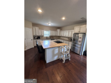 Midland, GA (Harris County) 4 Bed | 2.5 Bath | Waterfront on Woodlands Hills Golf Course in Georgia - for sale on GolfHomes.com, golf home, golf lot