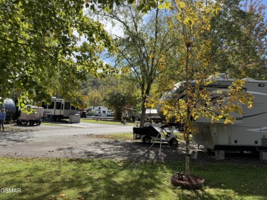 Beautifully landscaped LAKEFRONT RV lot in the sought after on Bent Creek Golf Course in Tennessee - for sale on GolfHomes.com, golf home, golf lot