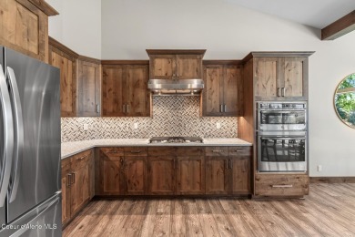 Welcome to this stunning 4 bedroom, 3 bathroom home located in on Hayden Lake Country Club in Idaho - for sale on GolfHomes.com, golf home, golf lot