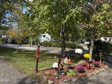 Beautifully landscaped LAKEFRONT RV lot in the sought after on Bent Creek Golf Course in Tennessee - for sale on GolfHomes.com, golf home, golf lot