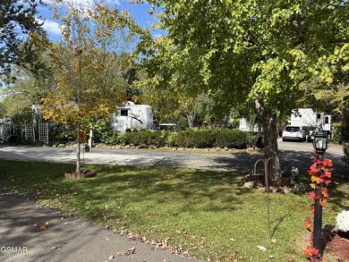 Beautifully landscaped LAKEFRONT RV lot in the sought after on Bent Creek Golf Course in Tennessee - for sale on GolfHomes.com, golf home, golf lot