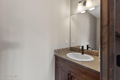 Welcome to this stunning 4 bedroom, 3 bathroom home located in on Hayden Lake Country Club in Idaho - for sale on GolfHomes.com, golf home, golf lot