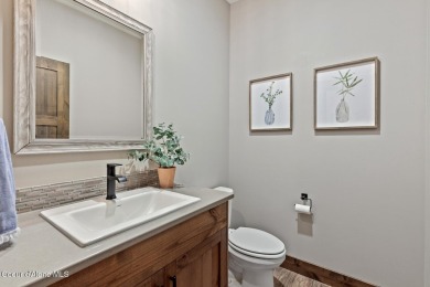 Welcome to this stunning 4 bedroom, 3 bathroom home located in on Hayden Lake Country Club in Idaho - for sale on GolfHomes.com, golf home, golf lot