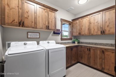 Welcome to this stunning 4 bedroom, 3 bathroom home located in on Hayden Lake Country Club in Idaho - for sale on GolfHomes.com, golf home, golf lot