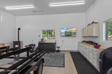 Welcome to this stunning 4 bedroom, 3 bathroom home located in on Hayden Lake Country Club in Idaho - for sale on GolfHomes.com, golf home, golf lot