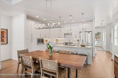 This contemporary, fully-furnished townhome is in the Fairway on River Valley Ranch Golf Club in Colorado - for sale on GolfHomes.com, golf home, golf lot