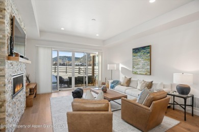 This contemporary, fully-furnished townhome is in the Fairway on River Valley Ranch Golf Club in Colorado - for sale on GolfHomes.com, golf home, golf lot