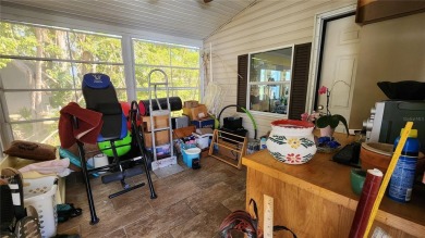 TWO BEDROOM, 1 1/2 BATHROOM MOBILE HOME IN ACTIVE 55+ COMMUNITY on River Run Golf Links in Florida - for sale on GolfHomes.com, golf home, golf lot