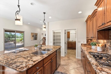 Savor Arizona resort living in this exquisite Saddlebrooke Ranch on Saddlebrooke Ranch Golf Club in Arizona - for sale on GolfHomes.com, golf home, golf lot