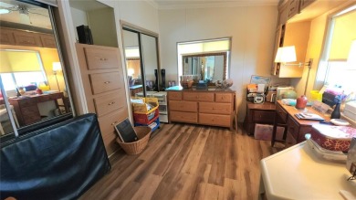 TWO BEDROOM, 1 1/2 BATHROOM MOBILE HOME IN ACTIVE 55+ COMMUNITY on River Run Golf Links in Florida - for sale on GolfHomes.com, golf home, golf lot