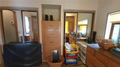 TWO BEDROOM, 1 1/2 BATHROOM MOBILE HOME IN ACTIVE 55+ COMMUNITY on River Run Golf Links in Florida - for sale on GolfHomes.com, golf home, golf lot
