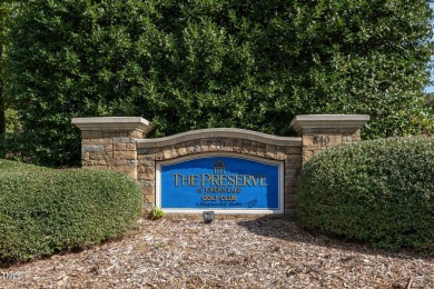 A distinctive single story home on 1/2 acre lot in The Preserve on The Preserve At Jordan Lake Golf Club in North Carolina - for sale on GolfHomes.com, golf home, golf lot